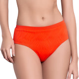 JULIETTE medium rise panty, textured orange bikini bottom by ALMA swimwear – front view 2