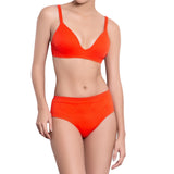 JULIETTE medium rise panty, textured orange bikini bottom by ALMA swimwear – front view 1